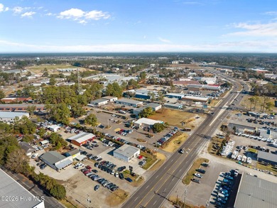 Over 100 feet of road frontage with a center turning lane and - photo 19