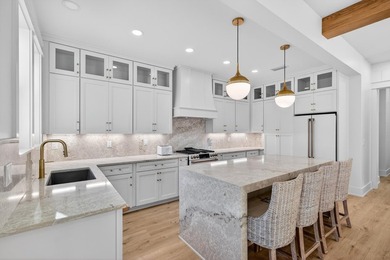 Discover the epitome of coastal luxury at 305 Elm St. in the - photo 20