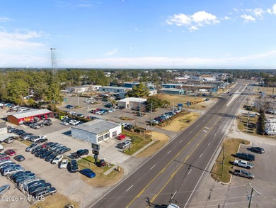Over 100 feet of road frontage with a center turning lane and - photo 20