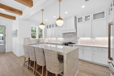 Discover the epitome of coastal luxury at 305 Elm St. in the - photo 21