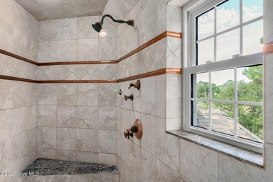 A rare opportunity to own a distinguished waterfront estate on - photo 21