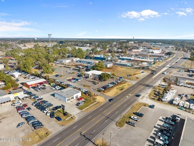 Over 100 feet of road frontage with a center turning lane and - photo 21