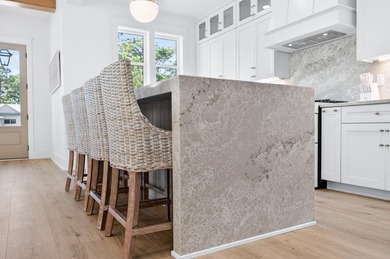 Discover the epitome of coastal luxury at 305 Elm St. in the - photo 22