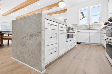 Discover the epitome of coastal luxury at 305 Elm St. in the - photo 23