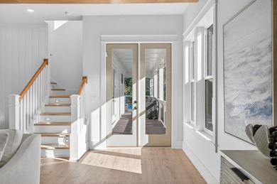 Discover the epitome of coastal luxury at 305 Elm St. in the - photo 24