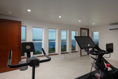 A newly reimagined oceanfront masterpiece perched above the - photo 27