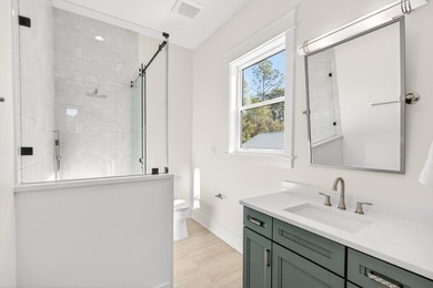 Discover the epitome of coastal luxury at 305 Elm St. in the - photo 30