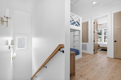 Discover the epitome of coastal luxury at 305 Elm St. in the - photo 35