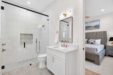 Discover the epitome of coastal luxury at 305 Elm St. in the - photo 44