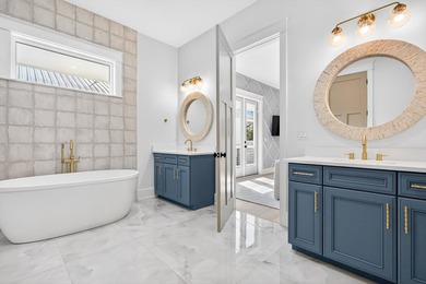 Discover the epitome of coastal luxury at 305 Elm St. in the - photo 48