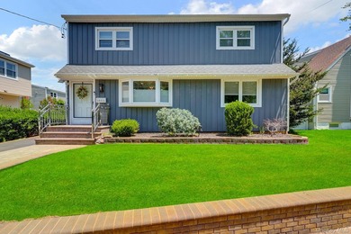 Welcome to this beautiful, renovated 4-bedroom, 2-bath home - photo 1