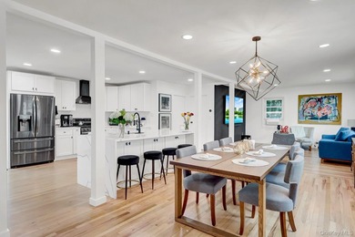 Welcome to this beautiful, renovated 4-bedroom, 2-bath home - photo 4