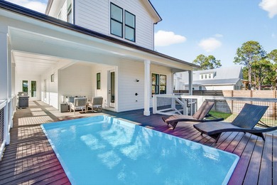 Discover the epitome of coastal luxury at 305 Elm St. in the - photo 58