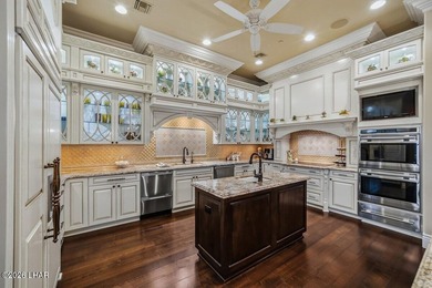 This custom built home sits on 5 lots total, delivering sweeping - photo 15