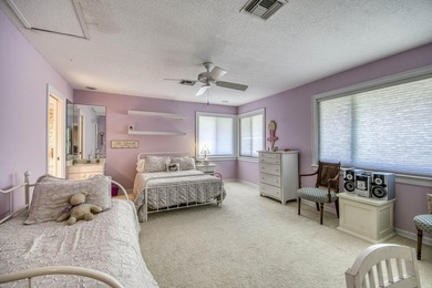 Set on nearly half an acre backing the Palmer golf course, this - photo 29