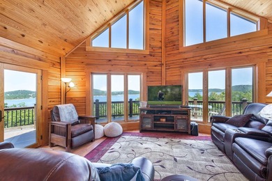 Set on 2.5 acres along the shoreline, this lakefront estate - photo 3