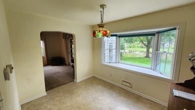 LAKEFRONT in downtown Hobart! This adorable classic brick home - photo 12