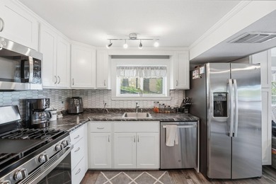 Completely renovated and move-in ready, this charming 2-bedroom - photo 16