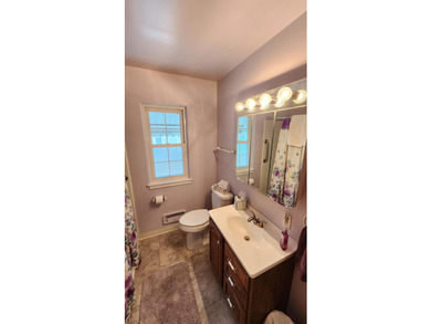 LAKEFRONT in downtown Hobart! This adorable classic brick home - photo 17