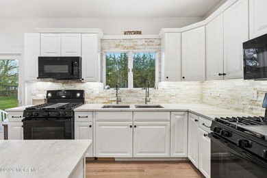 This one is a STUNNER! Set on over an acre of private property - photo 31