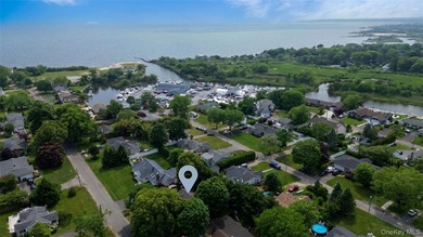 Nestled in the sought-after Patchogue Shores community, this - photo 2