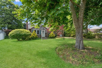 Nestled in the sought-after Patchogue Shores community, this - photo 3