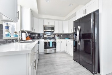 This stunning three-level waterfront home on Sunset Island - photo 12