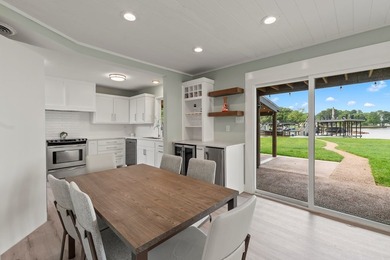 Positioned on a nearly half-acre (.483-acre) lot with 80' of - photo 7