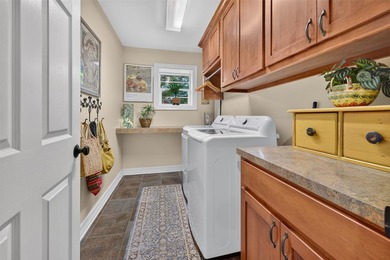 Located on three premium wooded lots in the gated community of - photo 11