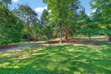 Located on three premium wooded lots in the gated community of - photo 30