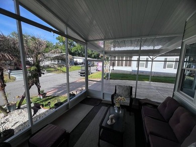 This well-maintained home features a membrane roof over the home - photo 19