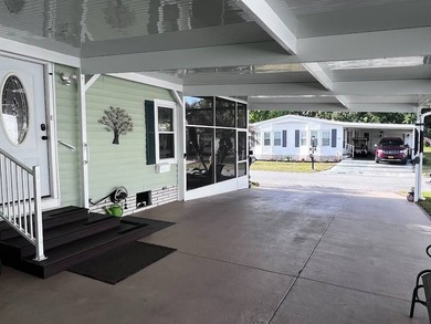 This well-maintained home features a membrane roof over the home - photo 21