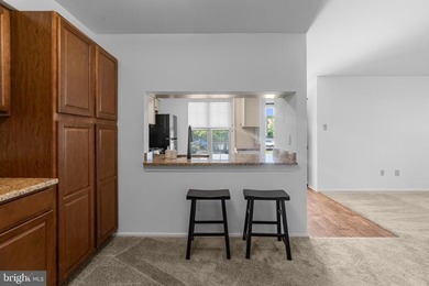 A MUST see move-in ready condo in the well-maintained and - photo 4
