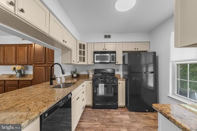 A MUST see move-in ready condo in the well-maintained and - photo 9