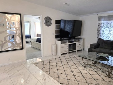 THIS HOME IS ON LEASED LAND WITH A MONTHLY LOT RENT OF $425 AND - photo 12