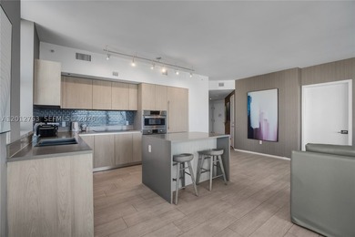 Beach-inspired, high-rise turnkey residence offering a new - photo 9