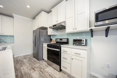 Welcome to effortless living in the heart of Mira Mesa. Situated - photo 5