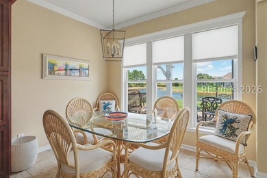 Set on a large premium lot with peaceful lagoon views, timeless - photo 12
