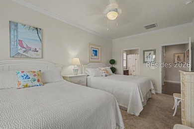 Set on a large premium lot with peaceful lagoon views, timeless - photo 23