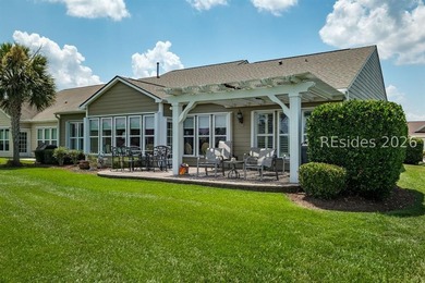 Set on a large premium lot with peaceful lagoon views, timeless - photo 28