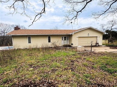 Investor special in Warsaw, MO! This 2-bedroom, 2.5-bath - photo 1
