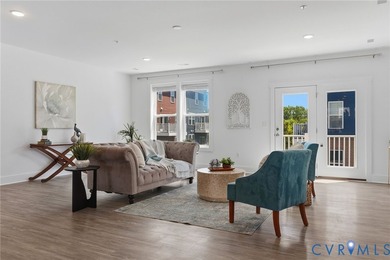 This beautifully designed two-story townhome style condo with a - photo 9