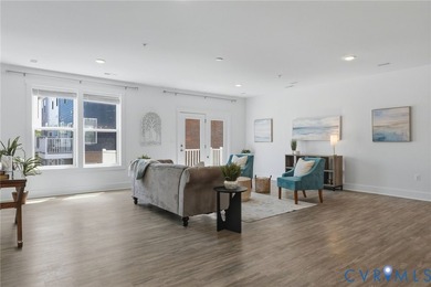 This beautifully designed two-story townhome style condo with a - photo 10