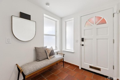 This gorgeous, light-filled home with wood floors throughout - photo 3