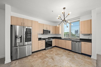 Introducing this beautifully updated and rare 3 bedroom corner - photo 3