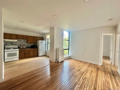 This fully renovated, spacious 2-bedroom apartment features - photo 2