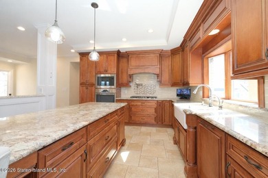 Welcome to this custom-built two-family detached home! This - photo 12
