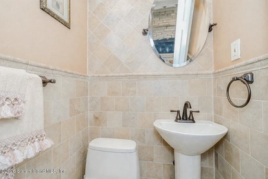 Welcome to this custom-built two-family detached home! This - photo 35