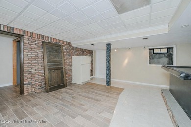 Welcome to this custom-built two-family detached home! This - photo 36