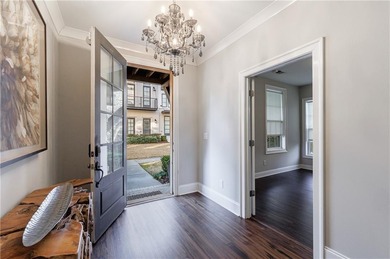 Welcome to refined townhome living in the heart of Sandy Springs